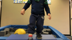 What makes children walk on their toes?